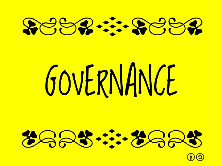A yellow sign with the word Governance written in black capital letters
